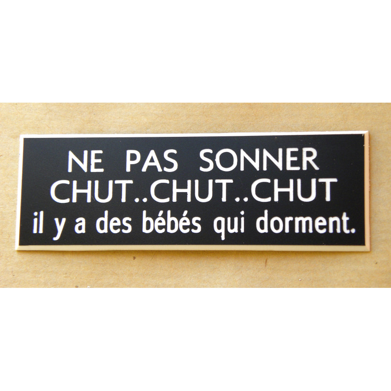 plaque blanche "NE PAS SONNER CHUT, CHUT CHUT il y a bébé qui dort"  format 70 x 200 mm
