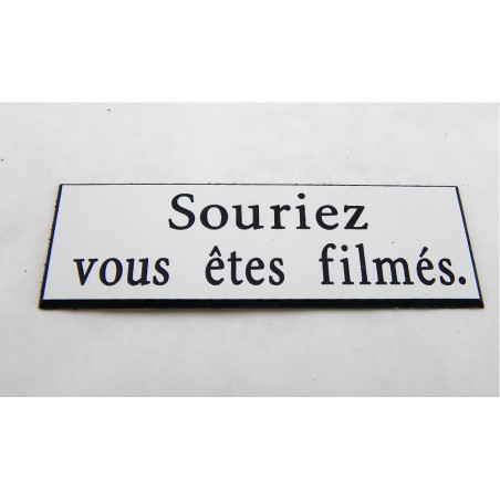 étiquette adhésive "souriez vous êtes filmés" multicolores