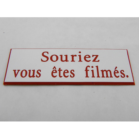étiquette adhésive "souriez vous êtes filmés" multicolores