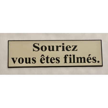 étiquette adhésive "souriez vous êtes filmés" multicolores