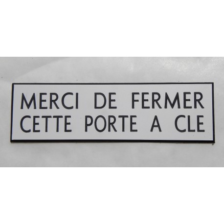 plaque gravée "MERCI DE FERMER CETTE PORTE A CLE" Fond  BLANC finition biseautée format 70 x 200 mm