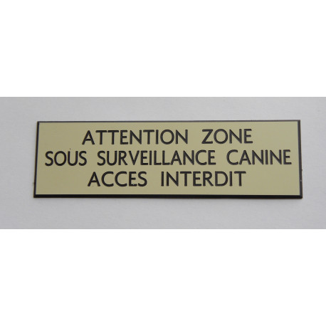 plaque gravée ivoire "ATTENTION ZONE SOUS SURVEILLANCE CANINE ACCES INTERDIT"   format 29 x 100 mm