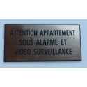 Plaque adhésive ATTENTION APPARTEMENT SOUS ALARME ET VIDEO SURVEILLANCE cuivrée