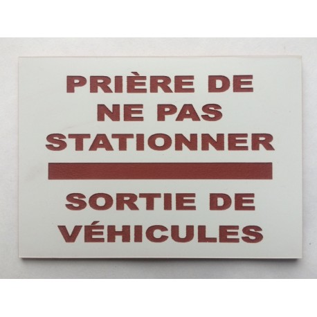 Plaque PRIÈRE DE NE PAS STATIONNER SORTIE DE VÉHICULES blanche et rouge